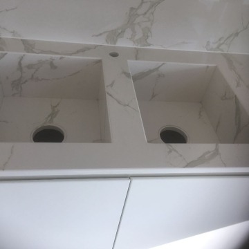 verlijmde spoelbakken in dekton natura x-gloss
